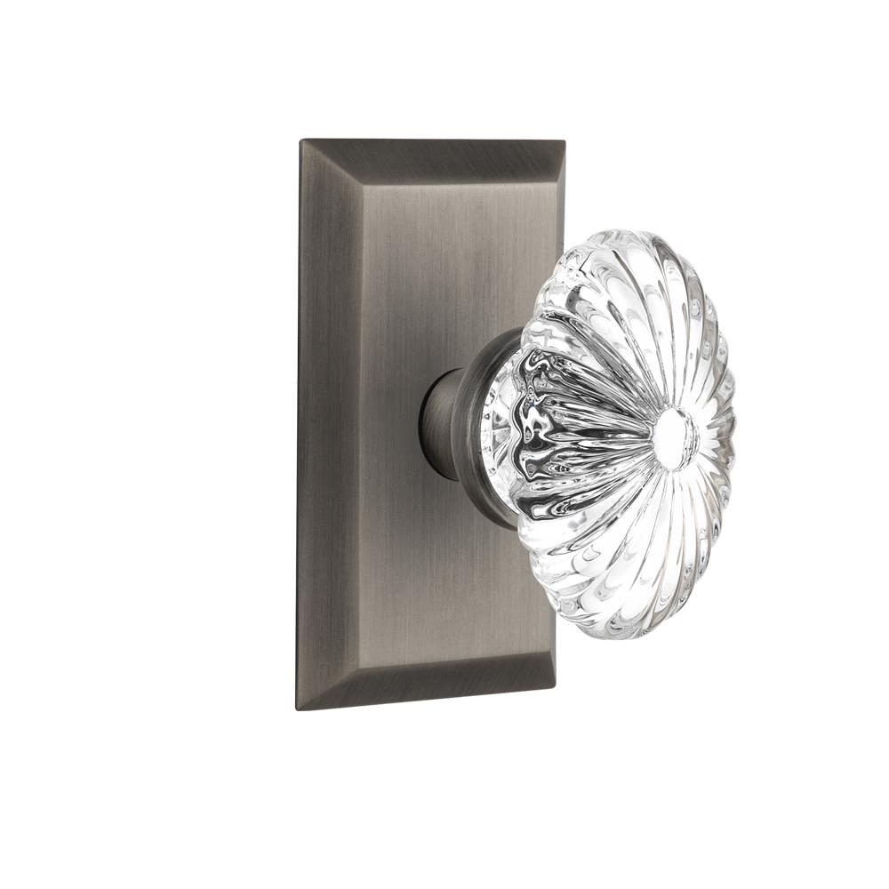 Nostalgic Warehouse STUOFC Passage Knob Studio Plate with Oval Fluted Crystal Knob in Antique Pewter